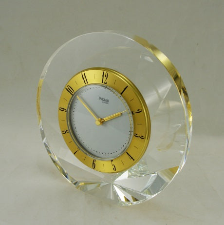 "Shell-Gold" Elegant Shell shaped desk clock made of real Crystal glass. Quartz clock with Gold finished brass timing and Arabic numerals. 145 dia x 45mm.1100 grams